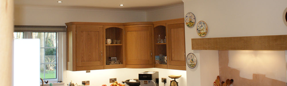 Heating and Hot Water Programmer/Timer and Four Gang Flat Plate Lighting Switch close up