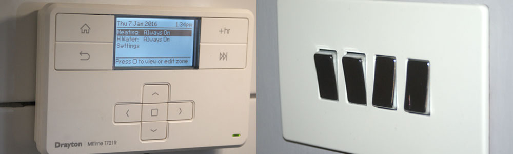 Heating and Hot Water Programmer/Timer and Four Gang Flat Plate Lighting Switch close up